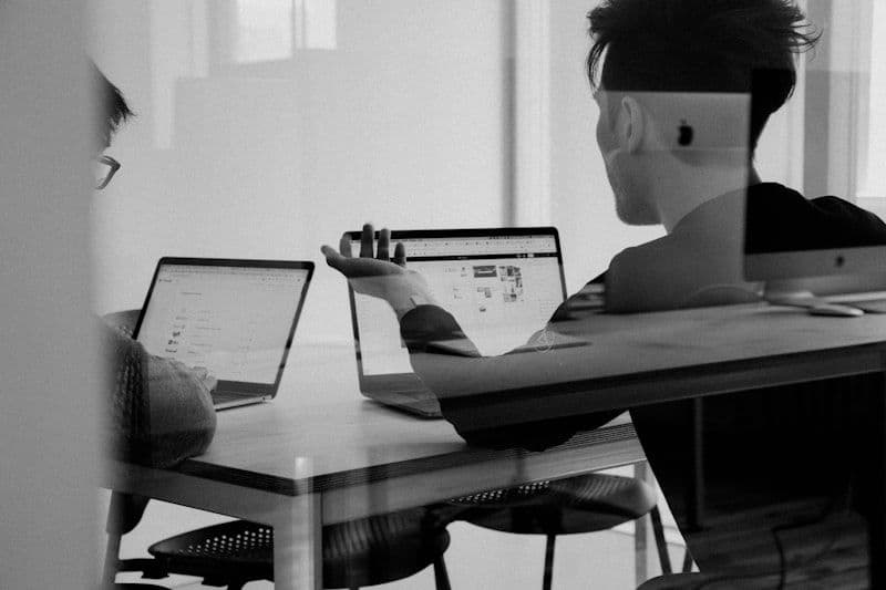 SaaS team analyzing product metrics and revenue dashboards