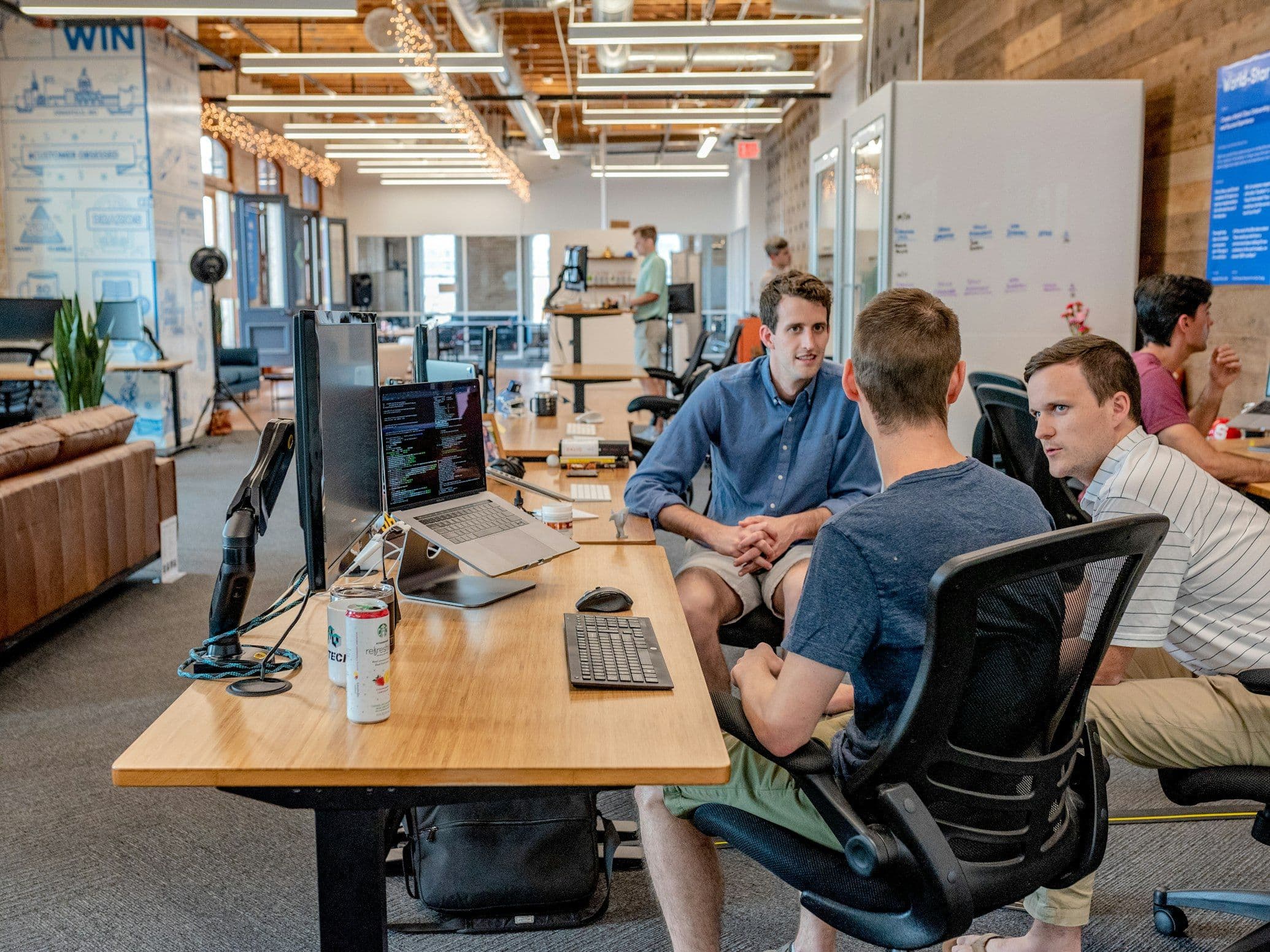 Remote project managers collaborating on software delivery